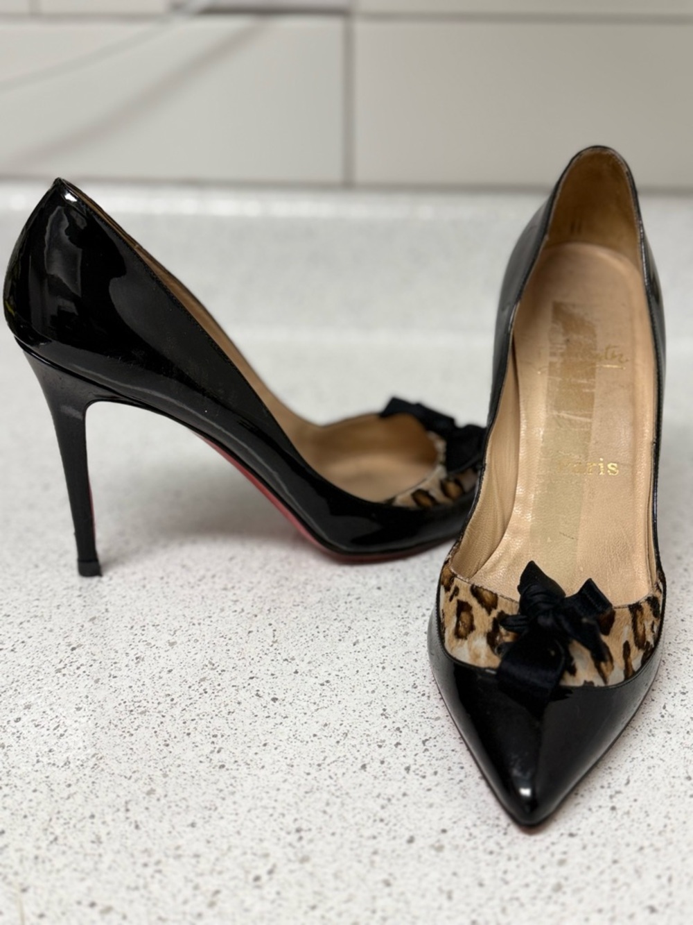 Christian Louboutin Black Patent Pointed Pumps with Leopard Trim and Bow